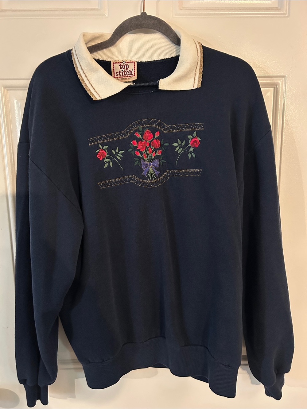 Top Stitch Navy Crewneck Sweater with Red Floral Embroidery and Cream Collar